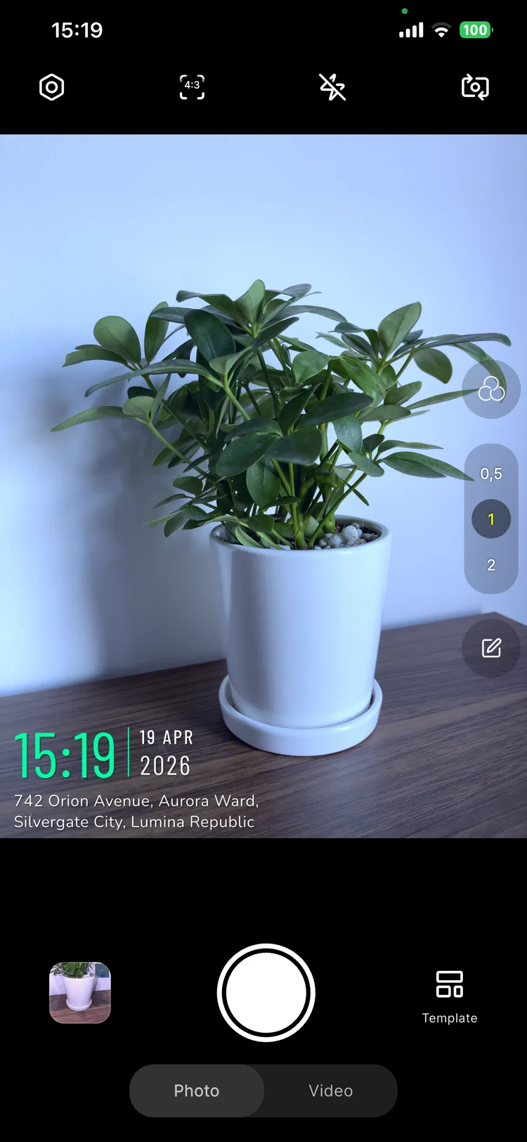 Timiora camera viewfinder with active watermark template and GPS overlay